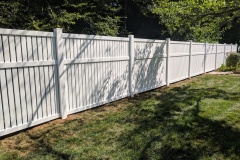 White vinyl picket fence