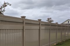 Tan vinyl fence