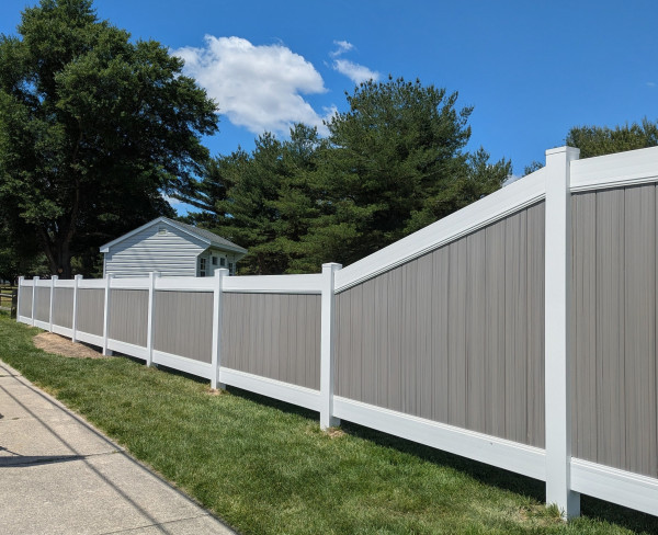 White-and-coastal-cedar-vinyl-fence