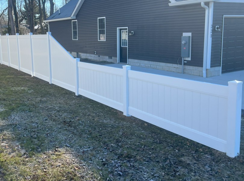 white-vinyl-fence-sloped-panel-