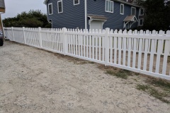 white vinyl picket fence