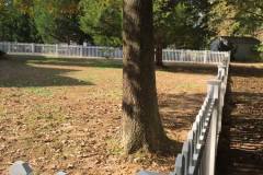 white vinyl picket fence