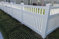 White vinyl picket fence